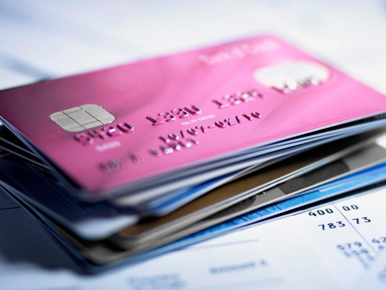 Credit card companies are asking a judge to stop a federal rule that'd cap late fees.