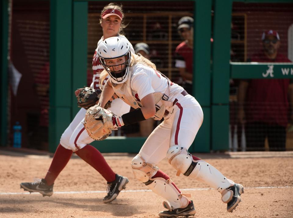 May 21, 2022; Tuscaloosa, AL, USA; Alabama catcher Ally Shipman (34) jumps out to field a bunt. Stanford defeated Alabama 6-0 in the winners bracket of the NCAA Tuscaloosa Regional Saturday at Rhoads Stadium. Mandatory Credit: Gary Cosby Jr.-The Tuscaloosa News