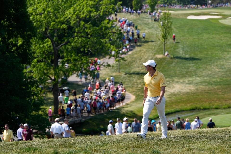 June 4, 2023; Dublin, Ohio, USA;  Rory McIlroy checks out the scoreboard as he walks to the 10 tee during the final round of the Memorial Tournament at Muirfield Village Golf Club. 