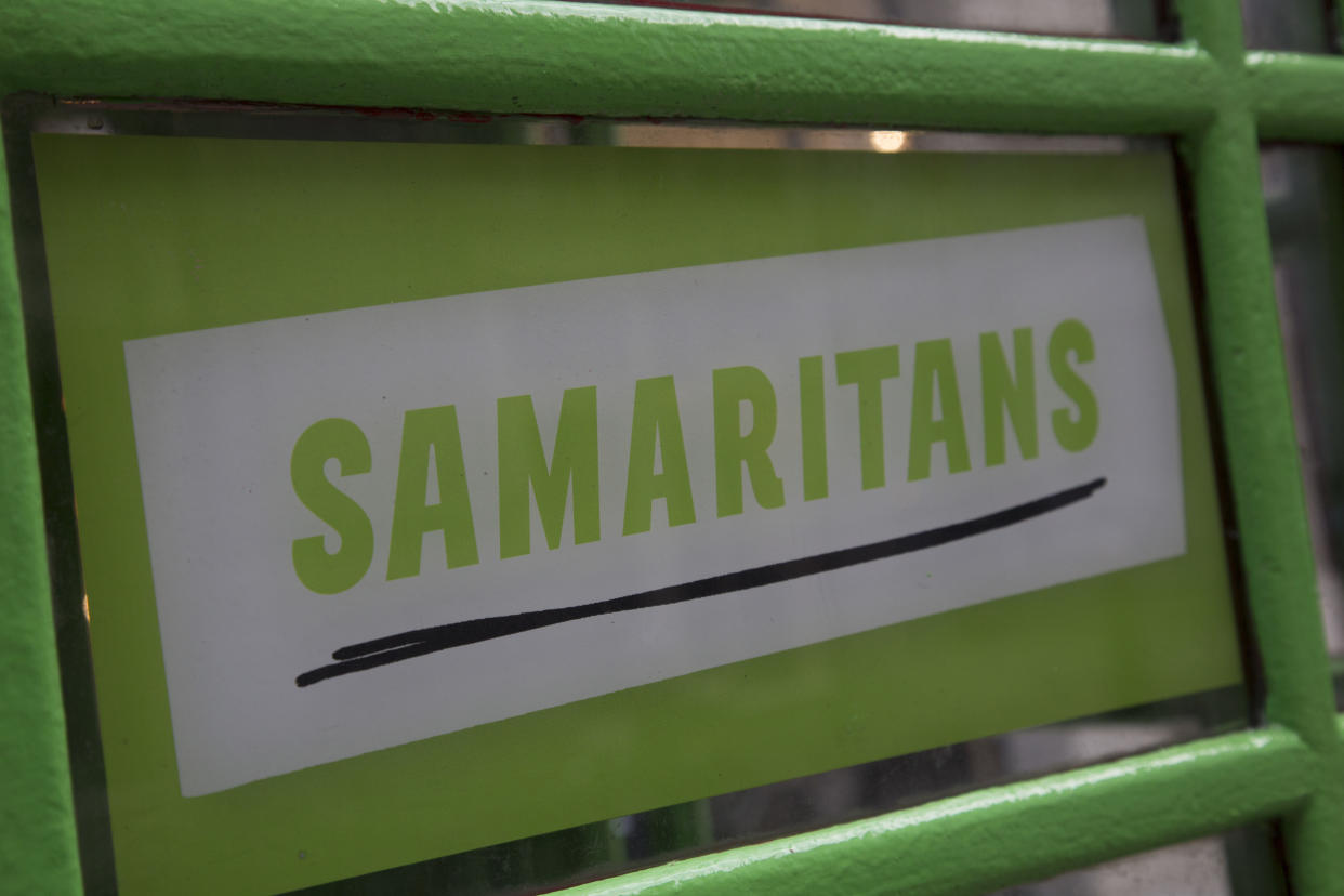 Green Samaritans charity sponsored phone boxes in the City of London, UK. Samaritans is a registered charity aimed at providing emotional support to anyone in distress, struggling to cope, or at risk of suicide throughout the United Kingdom and Ireland, often through their telephone helpline. (Photo by In Pictures Ltd./Corbis via Getty Images)