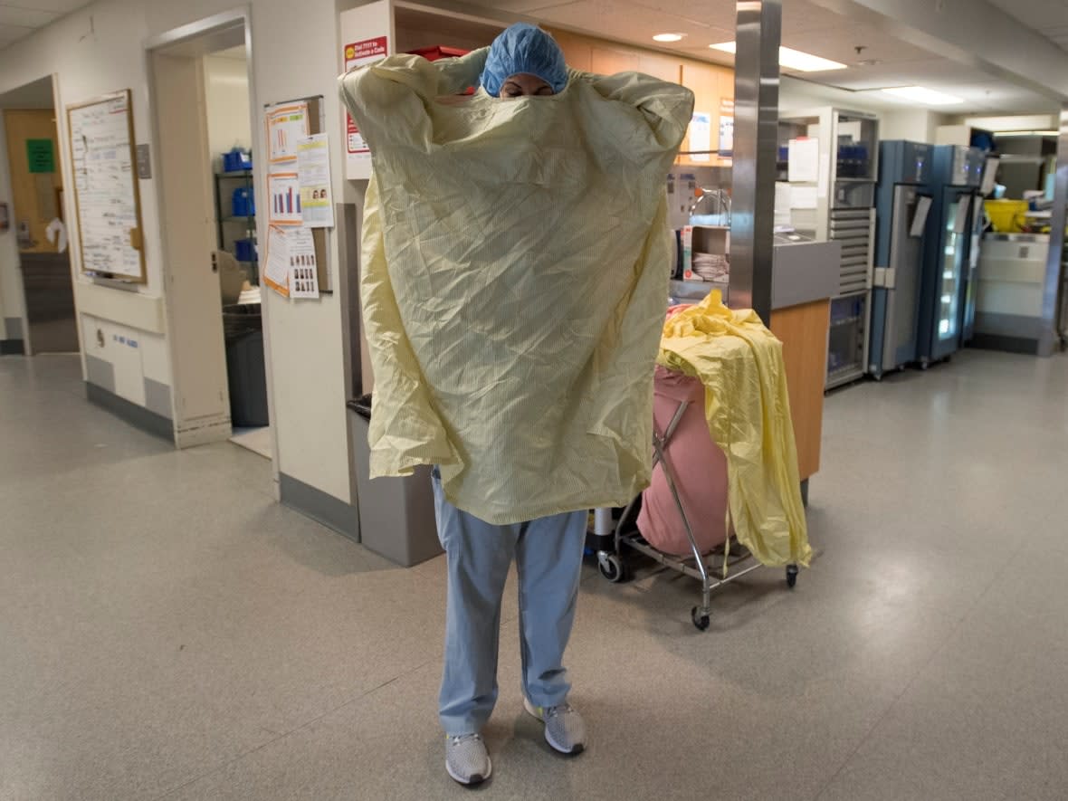 Health officials in B.C. say due to surging hospital demand, COVID-positive patients can share a room with non-COVID-19 patients who have received two vaccine doses. The policy is in use by the Fraser Health Authority. It's unclear if the policy is limited to hospitals in Fraser Health. (Jonathan Hayward/The Canadian Press - image credit)