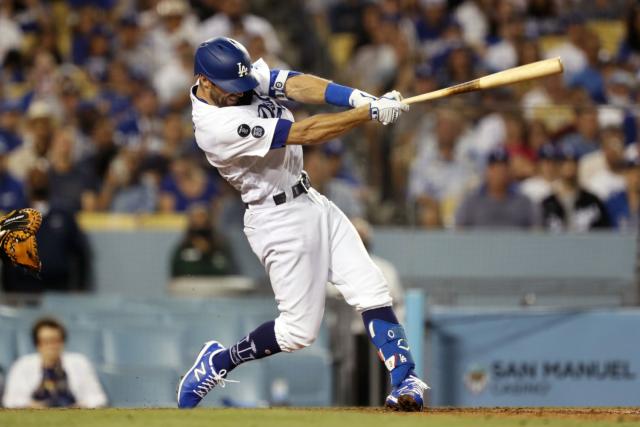 Trea Turner and Chris Taylor of the Los Angeles Dodgers celebrate