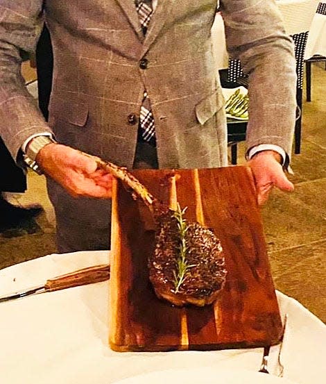 At Trevini, a 40-ounce tomahawk steak is served for two people.