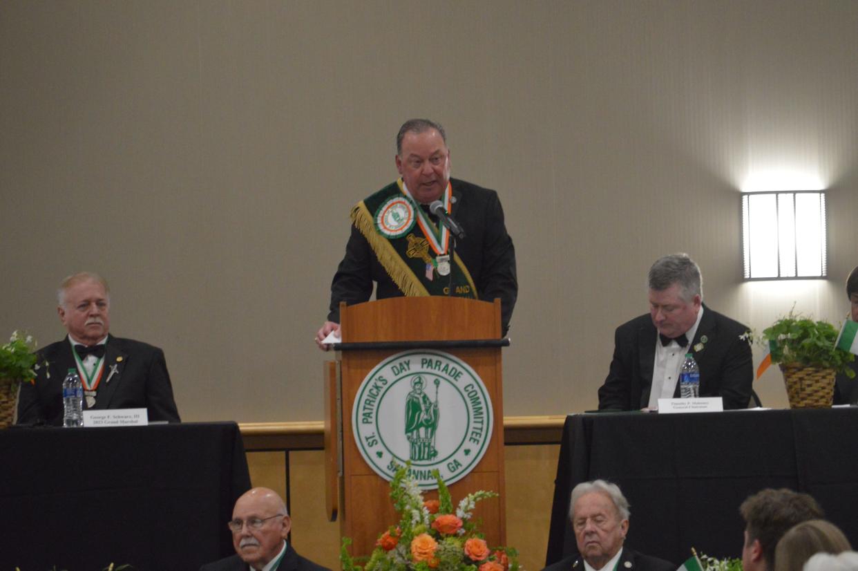 St. Patrick's Day Parade Grand Marshal John Forbes gives his marshal's address at the public investiture on Sunday.