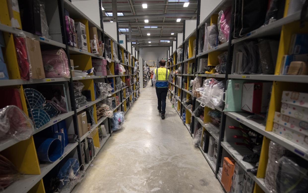 Amazon shed employees at a staggering rate during the pandemic, according to a new New York Times investigation. (AFP via Getty Images)