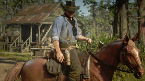 Arthur Morgan rides his horse in Red Dead Redemption 2.