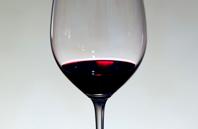 FILE PHOTO: A glass of red wine is displayed at the Chateau La Louviere in Leognan