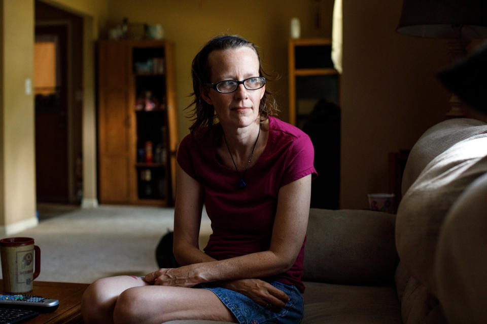 Meredith Lawrence sits in the living room&nbsp;of the home in Gainesville, Georgia, that she bought after her husband's death. (Photo: Dustin Chambers for HuffPost)