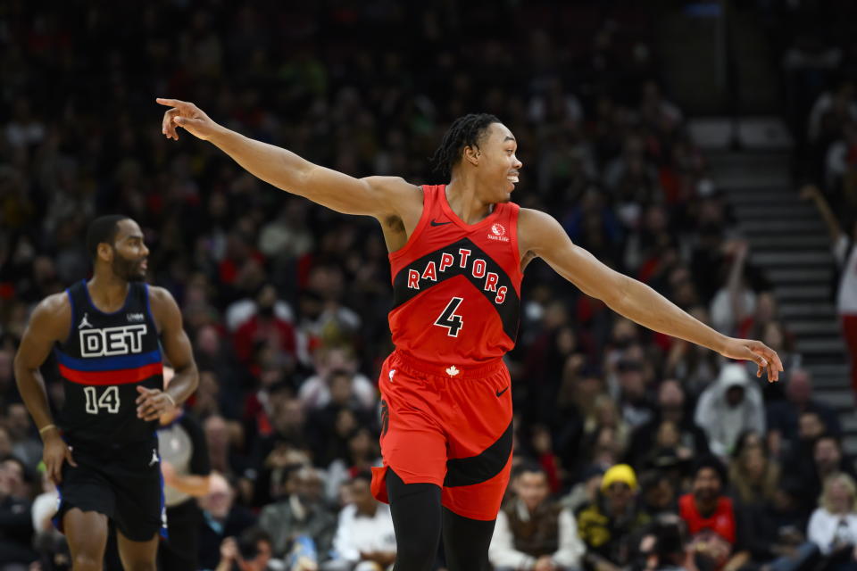 Toronto Raptors forward Scottie Barnes (4) reacts during the first half of an NBA basketball game against the Detroit Pistons in Toronto on Sunday, Nov. 19, 2023. (Christopher Katsarov/The Canadian Press via AP)