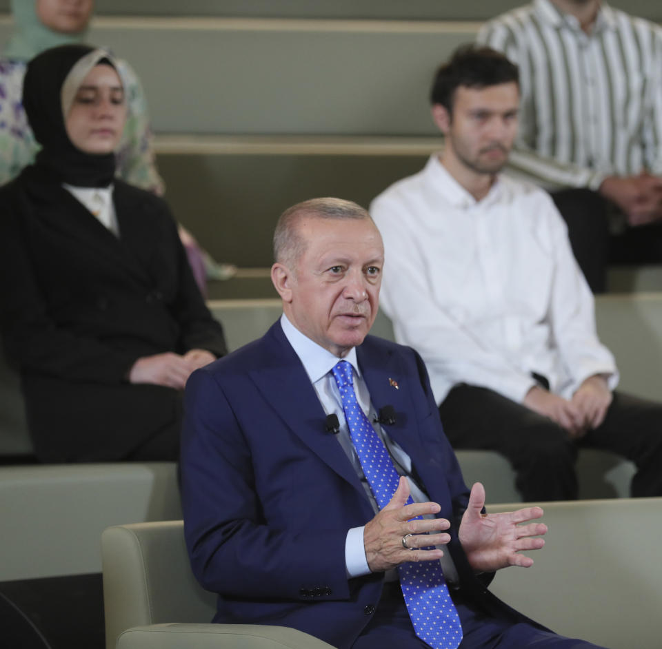 Turkish President Recep Tayyip Erdogan addresses his ruling party supporters in Ankara, Turkey, late Wednesday, May 18, 2022. Erdogan continued his opposition to Sweden and Finland joining NATO, stating Ankara would say "no" to their bid. Speaking to a group of Turkish youth, Turkish President accused the two countries and especially Sweden of being "a focus of terror, home to terror." (Turkish Presidency via AP Photo)