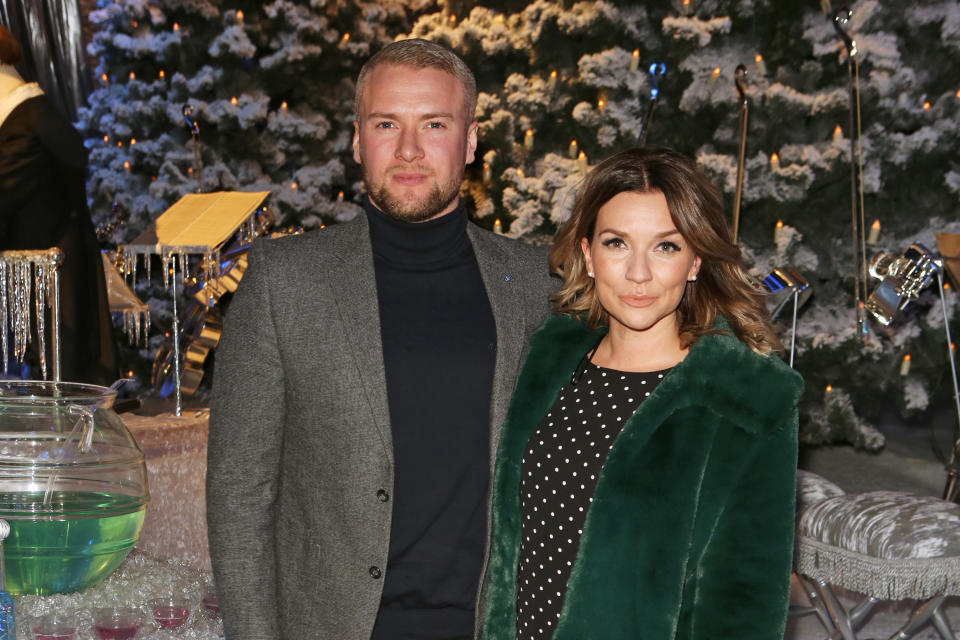 WATFORD, ENGLAND - NOVEMBER 22:  Liam Macaulay (L) and Candice Brown attend the VIP launch of "Hogwarts In The Snow" at Warner Bros. Studio Tour London: The Making Of Harry Potter on November 22, 2017 in Watford, England.  (Photo by David M. Benett/Dave Benett/Getty Images for Warner Bros. Studio Tour)