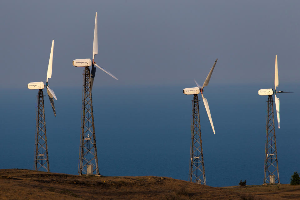 REPUBLIC OF CRIMEA, RUSSIA - JUNE 11, 2020: Wind turbines on Cape Meganom. Sergei Malgavko/TASS (Photo by Sergei Malgavko\TASS via Getty Images)