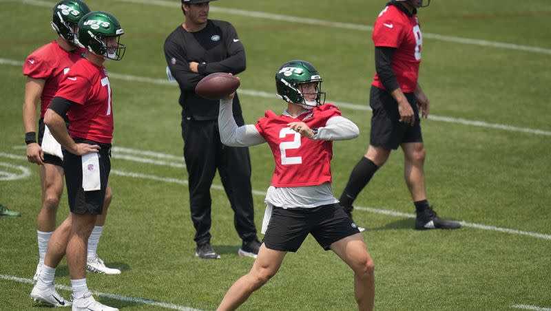 New York Jets quarterback Zach Wilson (2), second from right, throws at the NFL football team’s training facility in Florham Park, N.J., Tuesday, June 6, 2023. How big of roll will the former BYU star play in the upcoming HBO “Hard Knocks” series? Viewers may get an idea from the season premiere Wednesday.