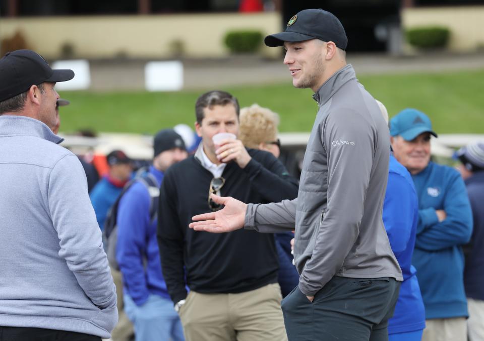 Buffalo Bills quarterback Josh Allen chats with other golfers at Jim Kelly's charity golf tournament at Terry Hills in Batavia.