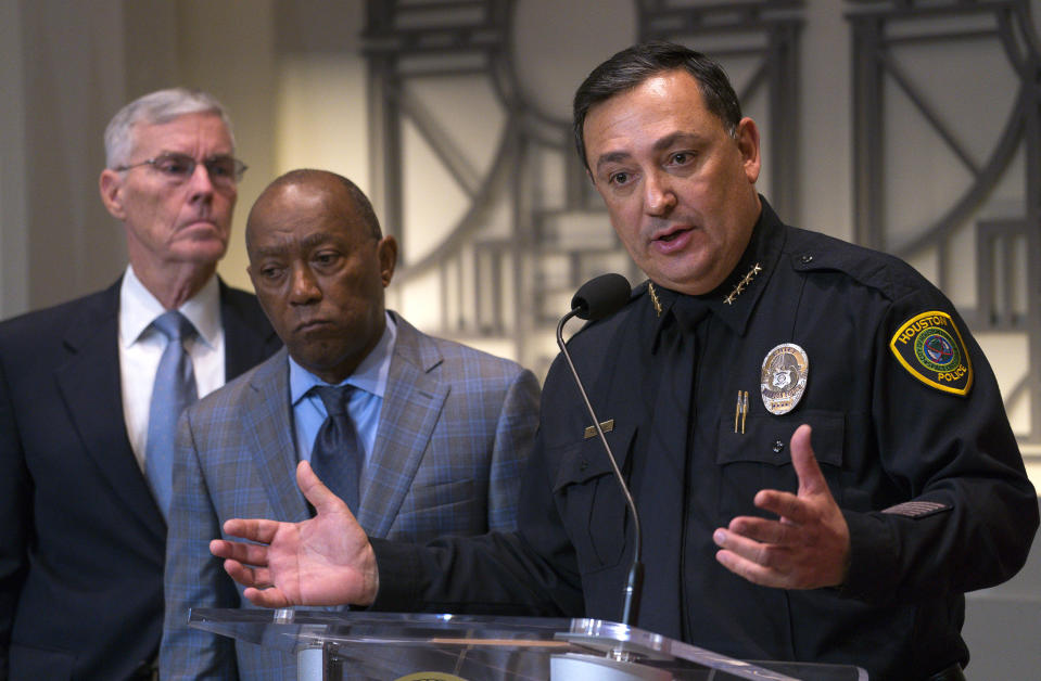 Houston Police Department Chief Art Acevedo joins Houston Mayor Sylvester Turner during a press conference updating the public on ongoing investigations related to the no-knock raid by narcotics officers that killed two people and injured five police officers last month, during a press conference from Houston City Hall, Wednesday, Feb. 20, 2019. (Mark Mulligan/Houston Chronicle via AP)