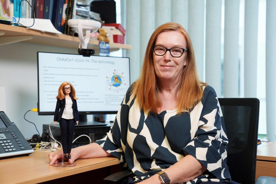 An undated handout picture released on August 3, 2021 shows Sarah Gilbert posing with a Barbie doll in her image. Toy giant Mattel said today it hoped to 