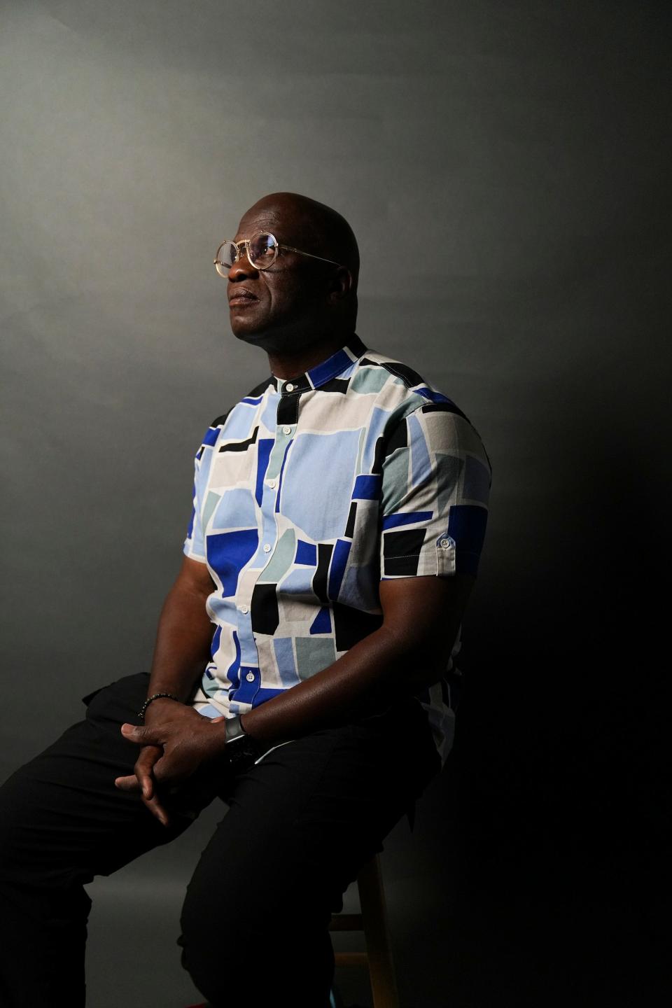 Sep 6, 2022; Columbus, OH, United States; Mujaddid Muhammad poses for a portrait in the Columbus Dispatch studio. Muhammad is seeking to recoup the full amount owed to him through a lawsuit meant to compensate  survivors of Boy Scout sexual abuse in the national bankruptcy case, instead of a partial amount currently allowed under state law Mandatory Credit: Brooke LaValley-The Columbus Dispatch