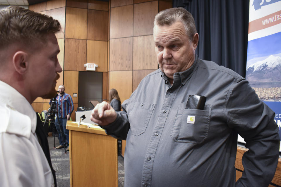 Sen. Jon Tester, D-Mont., speaks with a constituent prior to a town hall meeting hosted by the Democrat at Montana Technological University, Nov. 10, 2023, in Butte, Mont. Tester is seeking re-election to a fourth term. (AP Photo/Matthew Brown)