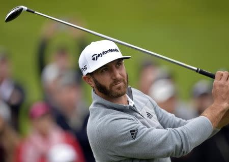 February 19, 2017; Pacific Palisades, CA, USA; Dustin Johnson hits from the tenth hole tee box during the continuation of third round play in the Genesis Open golf tournament at Riviera Country Club. Mandatory Credit: Gary A. Vasquez-USA TODAY Sports