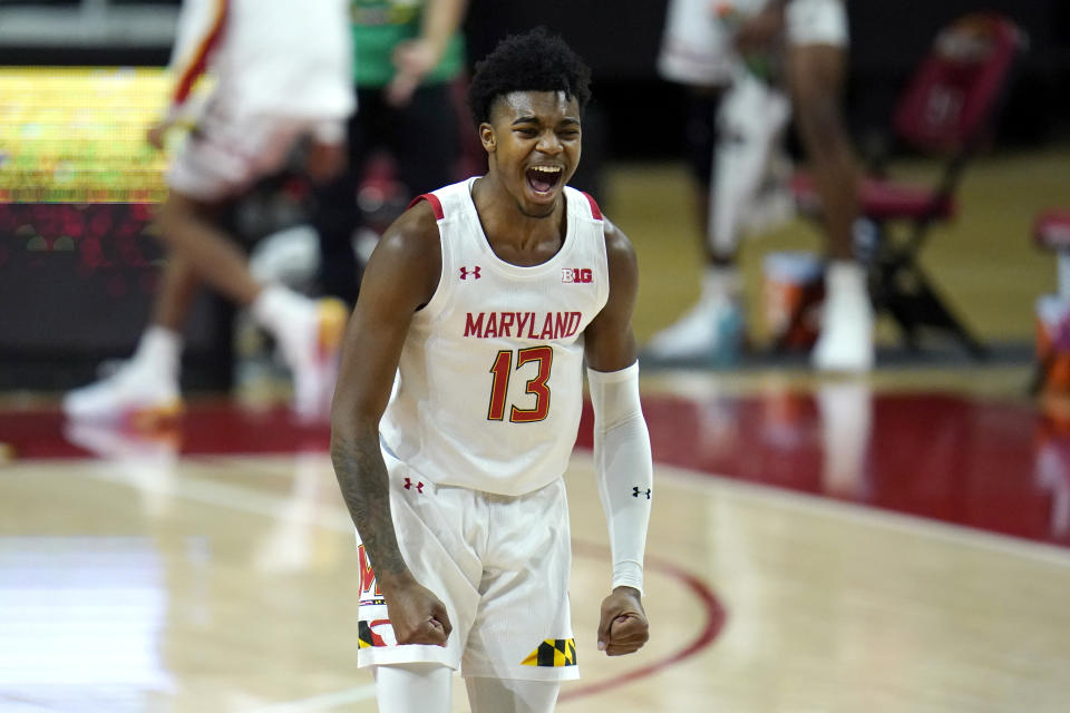 Maryland guard Hakim Hart reacts after scoring a three-point shot against St. Peter's during the first half of an NCAA college basketball game, Friday, Dec. 4, 2020, in College Park, Md. (AP Photo/Julio Cortez)