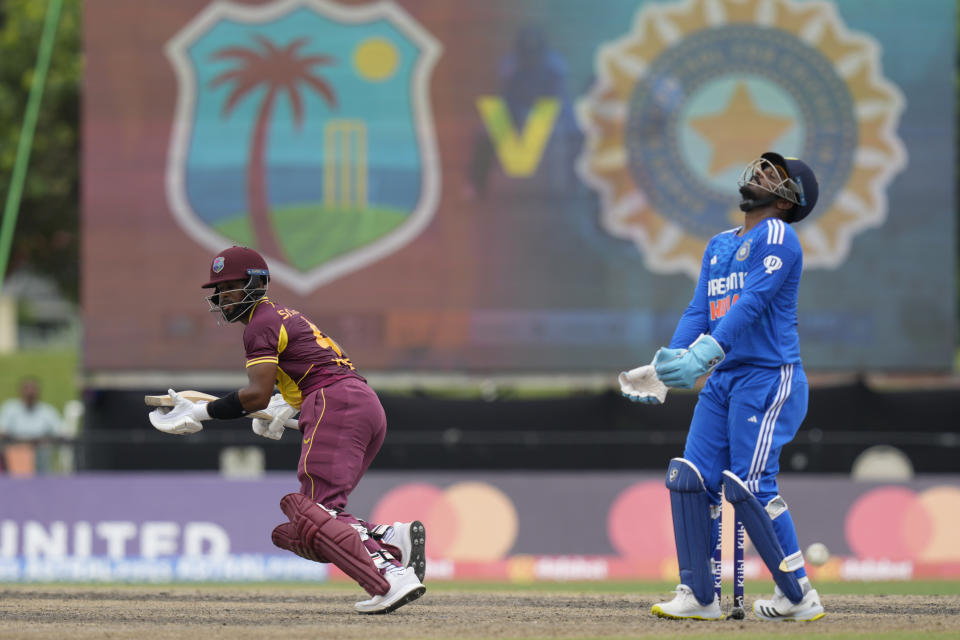 India's Sanju Samson looks up as West Indies' Shai Hope scores runs during the fifth T20 cricket match at Central Broward Regional Park in Lauderhill, Fla, Sunday, Aug. 13, 2023. (AP Photo/Ramon Espinosa)