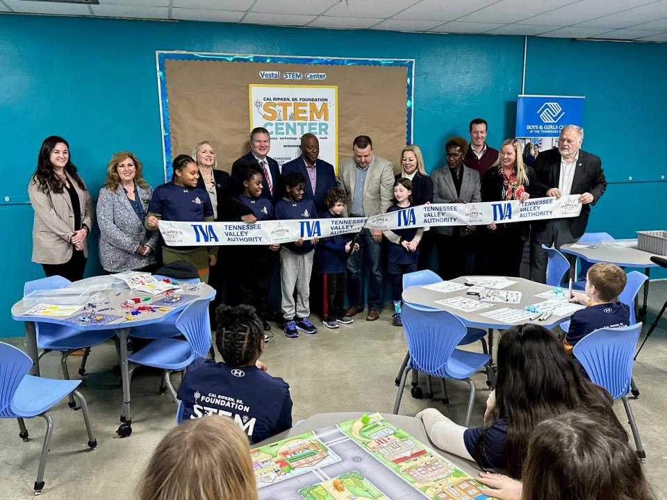 Elected officials including state Rep. Elaine Davis, Commissioners Carson Dailey and Larsen Jay, along with state Sen. Becky Massey and other representatives of TVA and the Boys & Girls Club, cut the ribbon at the STEM center at the South Knoxville Boys & Girls Vestal Club on Jan. 26, 2024.