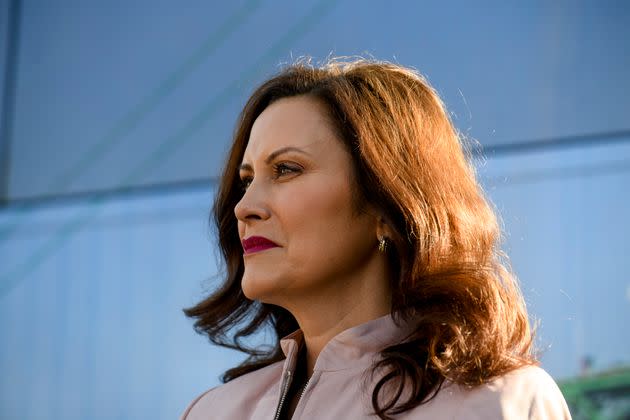 Michigan Gov. Gretchen Whitmer (D) stands by as Michigan Attorney General Dana Nessel (D) speaks to supporters during a campaign kickoff event in Detroit on Oct. 21. (Photo: Brittany Greeson for HuffPost)