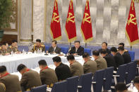 In this photo provided by the North Korean government, North Korean leader Kim Jong Un, rear center, attends a meeting of the Central Military Commission of the ruling Workers' Party, which were held between June 21 and 23, 2022, in Pyongyang, North Korea. Independent journalists were not given access to cover the event depicted in this image distributed by the North Korean government. The content of this image is as provided and cannot be independently verified.(Korean Central News Agency/Korea News Service via AP)
