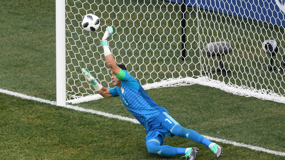 Essam El Hadary became the oldest player in World Cup history on Monday and marked the occasion with a penalty save.