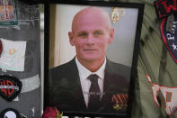 FILE - A portrait of Dmitry Utkin, who oversaw Wagner Group's military operations, is shown at an informal street memorial near the Kremlin in Moscow, Russia, Saturday, Aug. 26, 2023. Utkin, whose military call sign Wagner gave the name to the group, is presumed to have died in a plane crash along with Wagner's owner Yevgeny Prigozhin and other military company's officers was buried at the Federal Military Memorial Cemetery in Mytishchy, outside Moscow on Thursday, Aug. 31, 2023. (AP Photo/(AP Photo/Alexander Zemlianichenko, File )