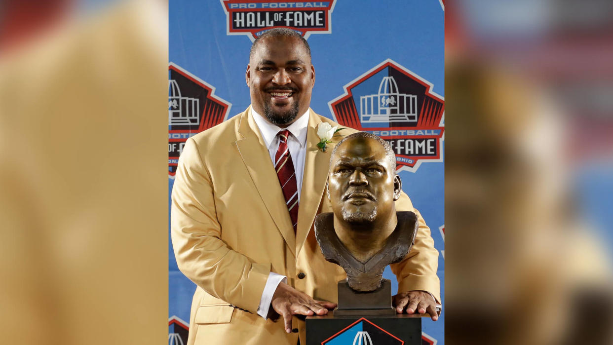 Mandatory Credit: Photo by Tony Dejak/AP/Shutterstock (6120651ad)Walter Jones Hall of Fame inductee Walter Jones poses with his bust during the 2014 Pro Football Hall of Fame Enshrinement Ceremony at the Pro Football Hall of Fame, in Canton, OhioHall of Fame Football, Canton, USA.