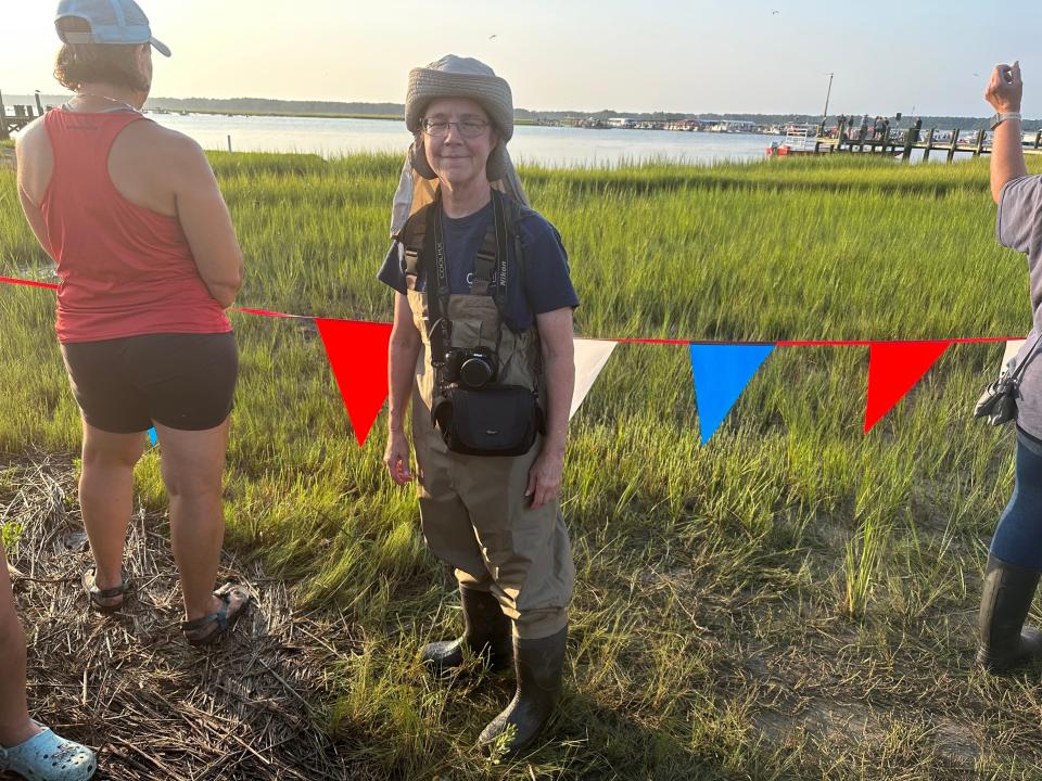 Julie Holtzer came from Bristol, Va., and got all decked out in waders and more for the big pony swim.