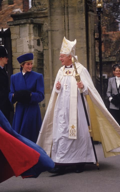 Diana, Princess of Wales, with the Archbishop of Canterbury in December 1986 - Credit: Hulton Archive/Getty Images