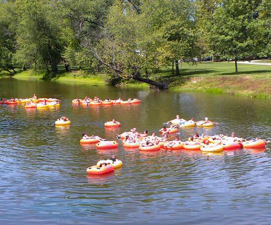 Red tubes on river