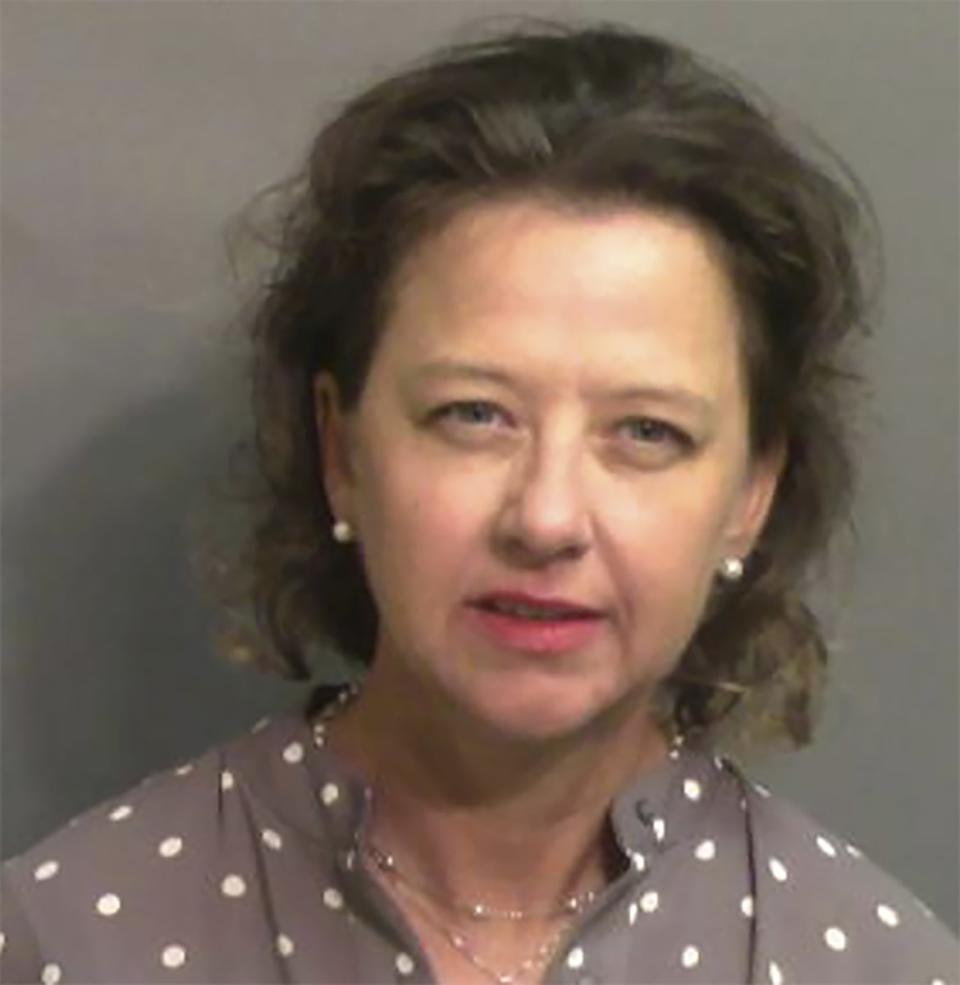 <div class="inline-image__caption"><p>Jackie Johnson, the former district attorney for Georgia’s Brunswick Judicial Circuit, after she turned herself in to the Glynn County jail in Brunswick, Ga, on Sept. 8, 2021. A grand jury indicted Johnson on charges of violating her oath of office and obstructing police in her handling of the February 2020 killing of Ahmaud Arbery.</p></div> <div class="inline-image__credit">Glynn County Sheriff’s Office via AP</div>