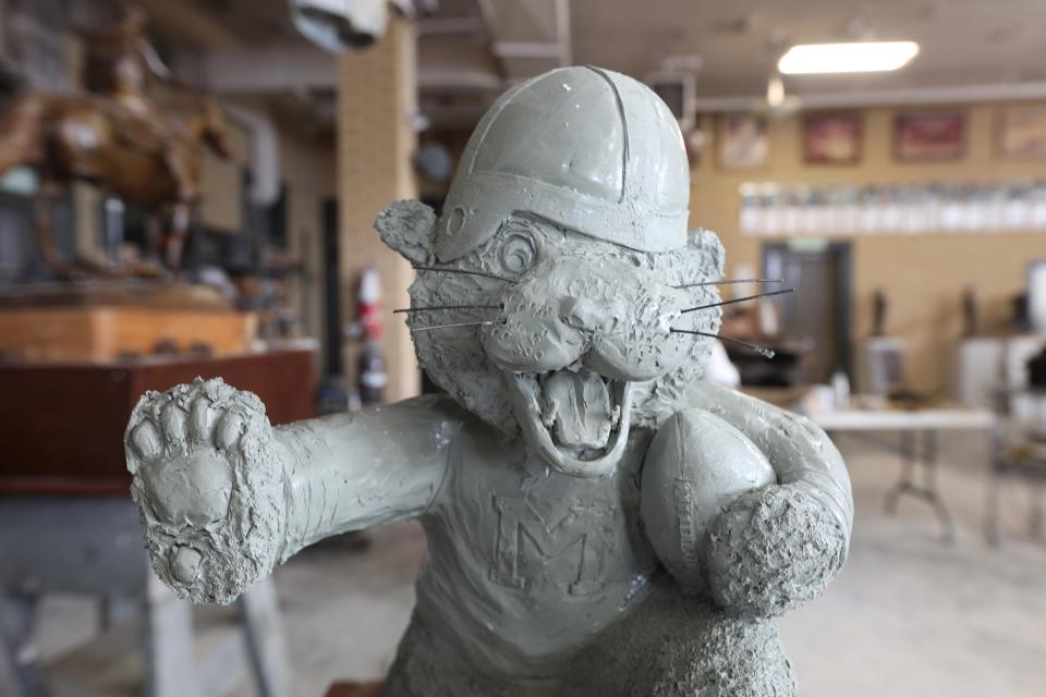 A close-up view of the model sculptor Alan Cottrill works from while working on a statue of Massillon Tigers mascot Obie.