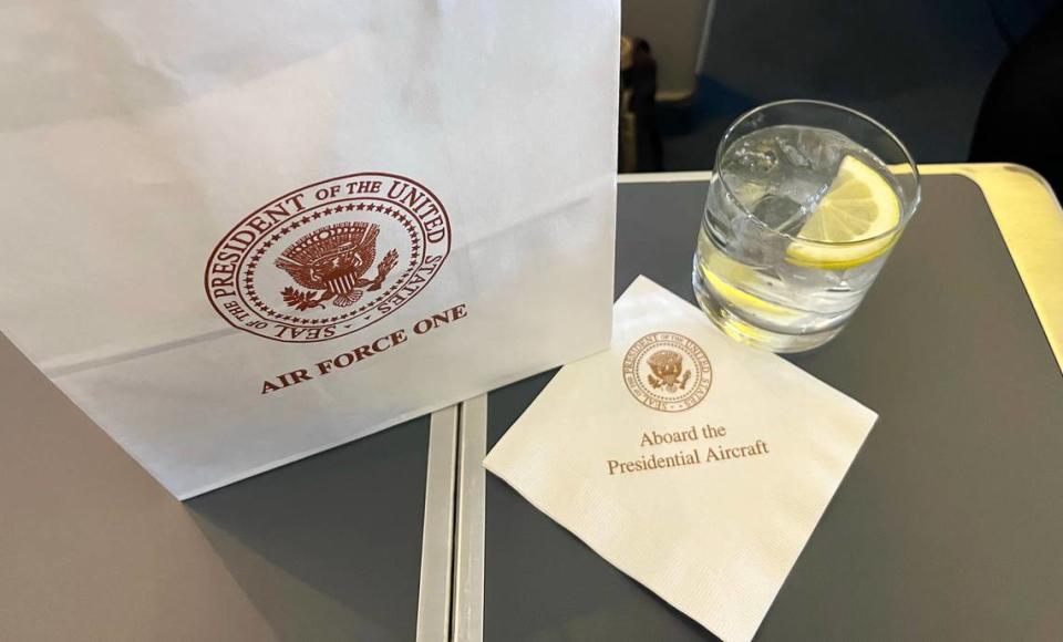 A lunch is delivered on Air Force One. In the bag: an Italian hoagie, a bag of vegetable chips and two snickerdoodle cookies.