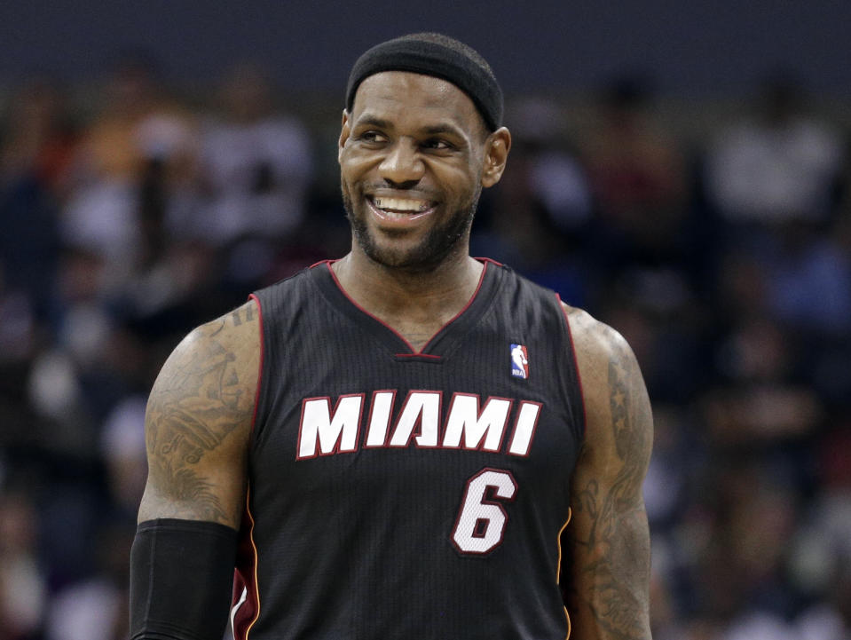 Miami Heat's LeBron James as he walks down the court during the second half in Game 4 of an opening-round NBA basketball playoff series against the Charlotte Bobcats in Charlotte, N.C., Monday, April 28, 2014. The Heat won 109-98, sweeping the series. (AP Photo/Chuck Burton)