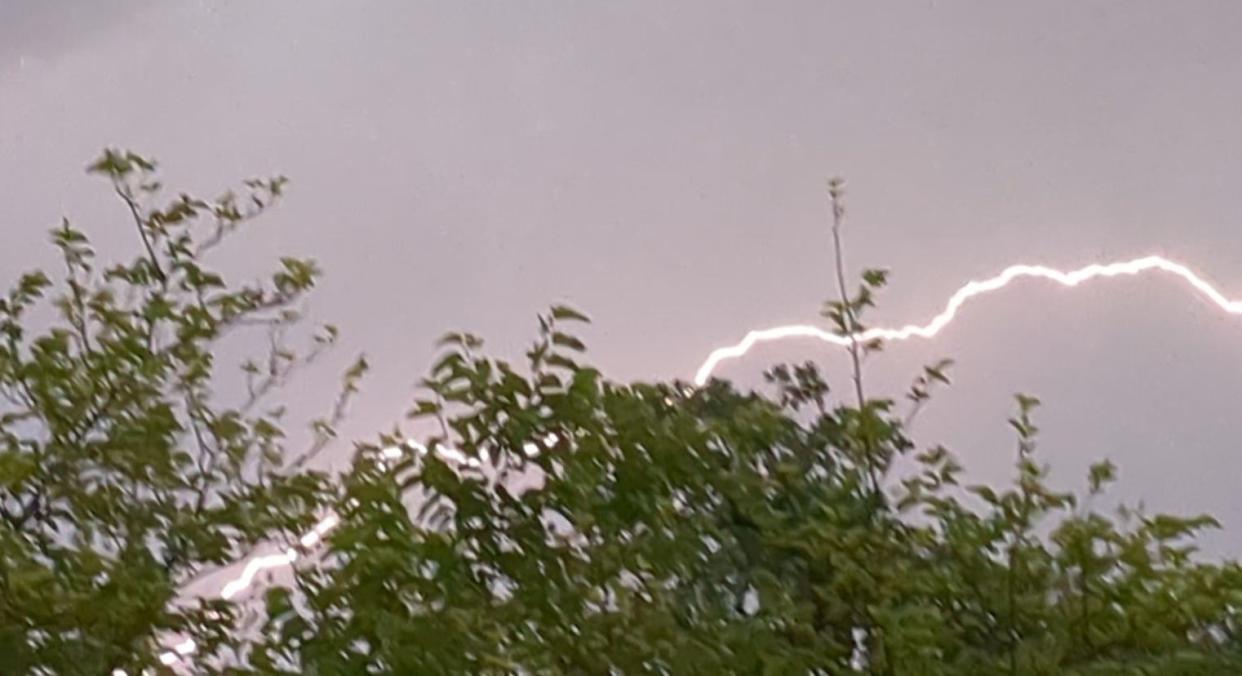 Lightning shoots over Redding during an evening thunderstorm on Monday, June 5, 2023.