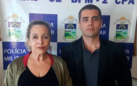 Dr. Denis Cesar Barros Furtado, right, and his mother Maria de Fatima Barros - Credit: AP