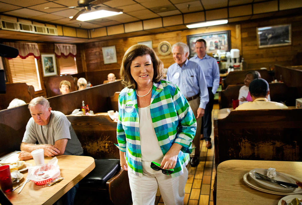 <p>Karen Handel, Republican candidate for Georgia’s 6th congressional district greets diners during a campaign stop at Old Hickory House in Tucker, Ga., Monday, June 19, 2017. (Photo: David Goldman/AP) </p>