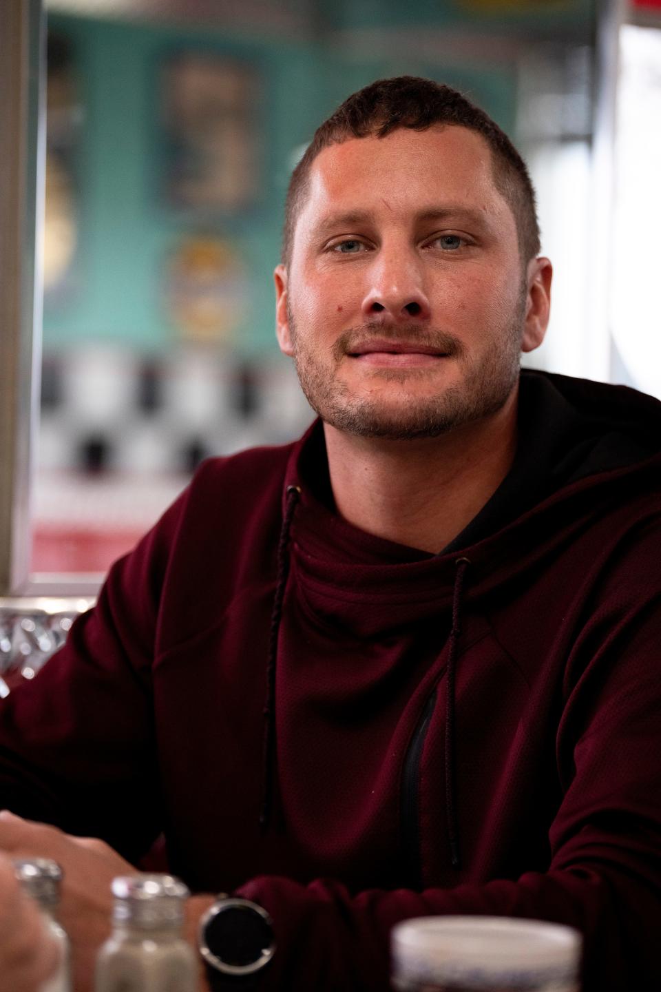 Robert Hershberger, 30, of Georgetown, sits at a diner in Seaman.