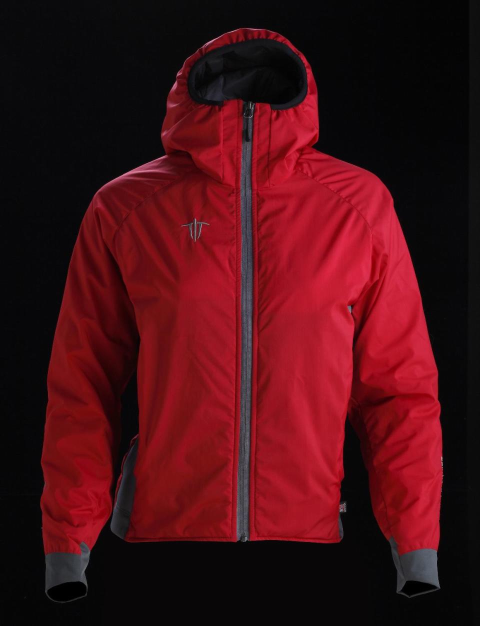 This product image released by Wild Things shows a women's Insulight jacket, featuring an insulated hood. (AP Photo/Wild Things)