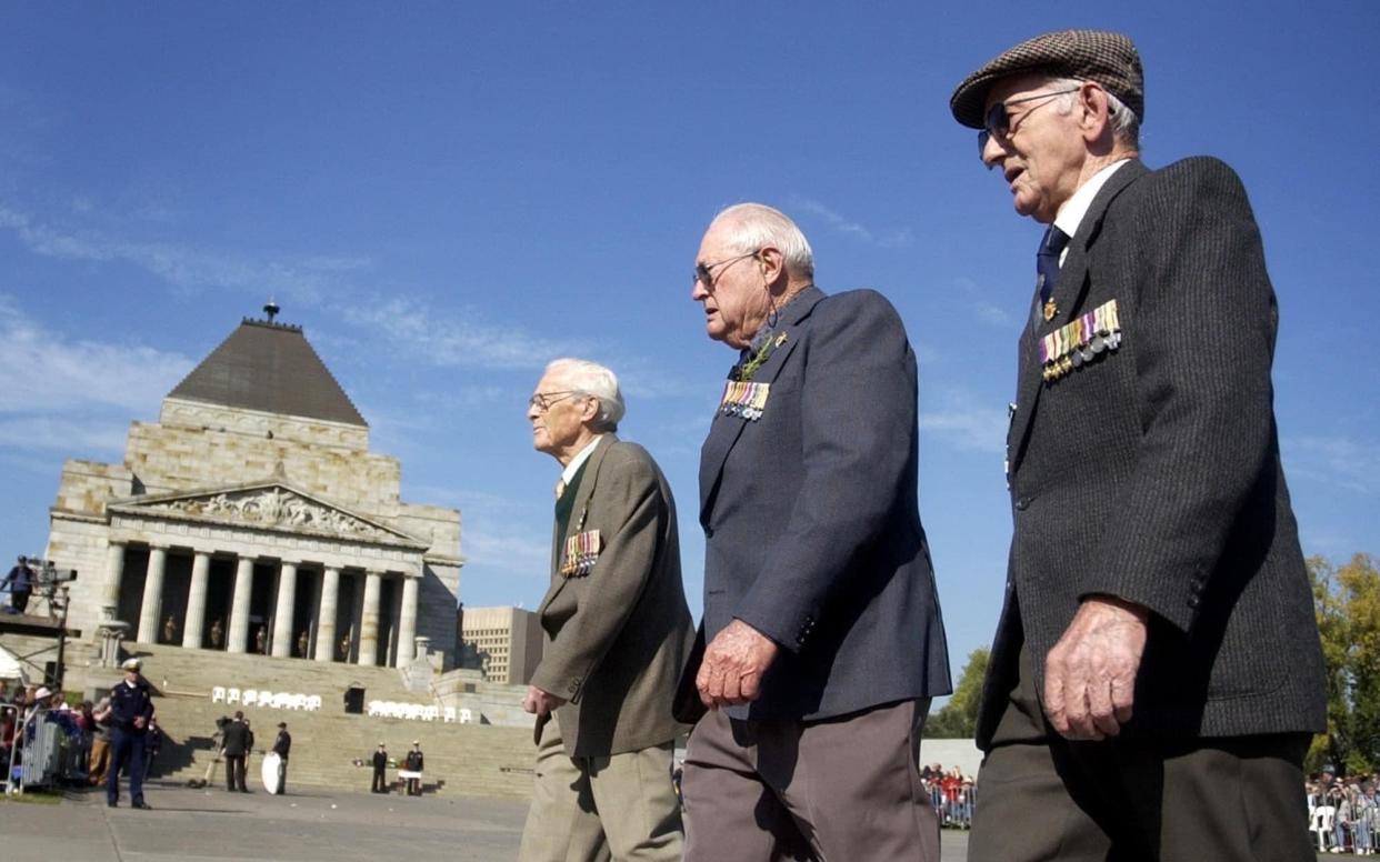 Pritchard, centre, marching with comrades on Anzac Day