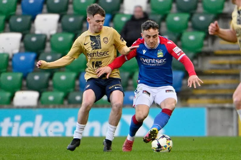 Photo shows Coleraine’s Alfie Gaston (left) in action against Linfield's Joel Cooper