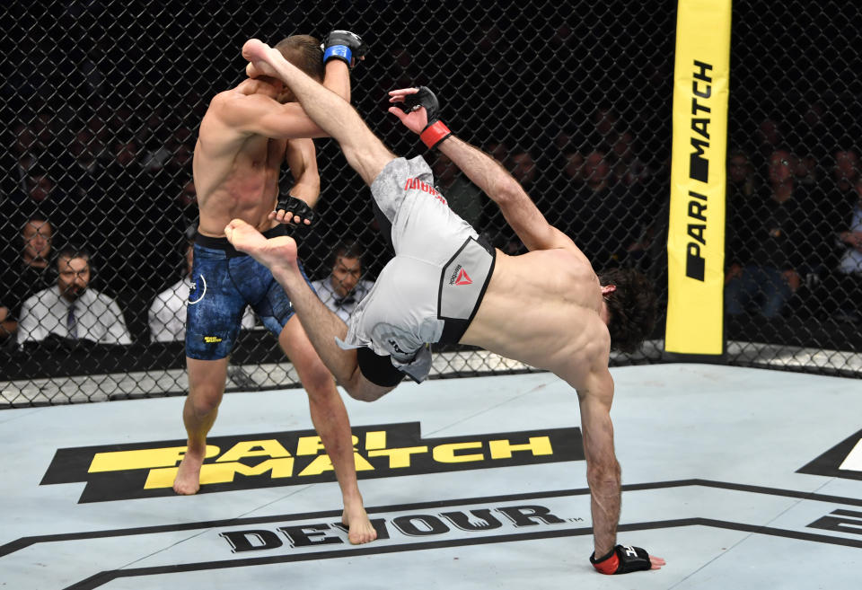 MOSCOW, RUSSIA - NOVEMBER 09:   (R-L) Zabit Magomedsharipov of Russia kicks Calvin Kattar in their featherweight fight during the UFC Fight Night event at CSKA Arena on November 09, 2019 in Moscow, Russia. (Photo by Jeff Bottari/Zuffa LLC via Getty Images)