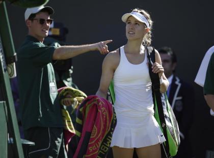 Eugenie Bouchard of Canada leaves the court after losing to Ying-Ying Duan of China in the singles first round match at the All England Lawn Tennis Championships in Wimbledon, London, Tuesday June 30, 2015. (AP Photo/Pavel Golovkin)