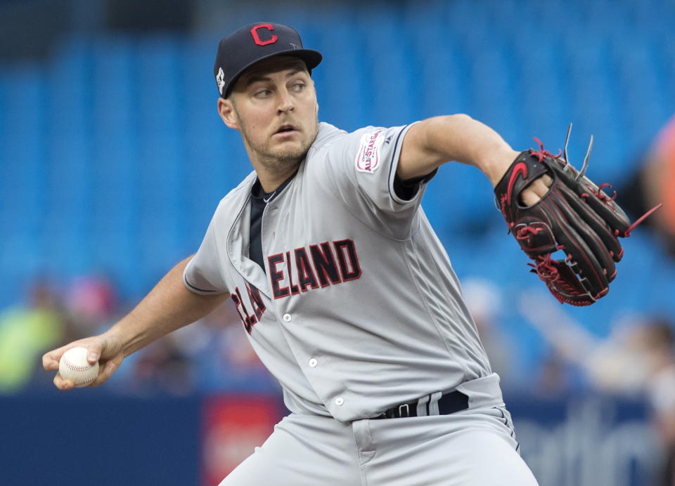 Cleveland Indians starting pitcher Trevor Bauer throws against the Toronto Blue Jays during the first inning of a baseball game, Tuesday, July 23, 2019 in Toronto. (Fred Thornhill/Canadian Press via AP)