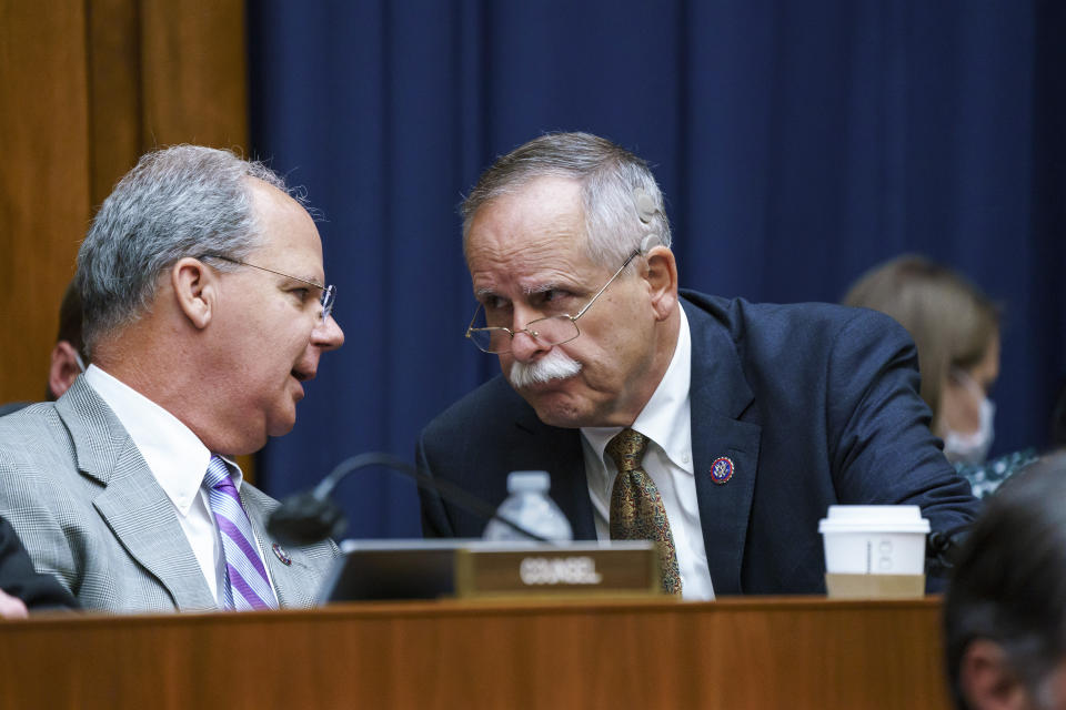 FILE - House Energy and Commerce members Rep. Brett Guthrie, R-Ky., left, and Rep. David McKinley, R-W.Va., talk at the Capitol in Washington, Wednesday, Sept. 15, 2021. (AP Photo/J. Scott Applewhite, File)