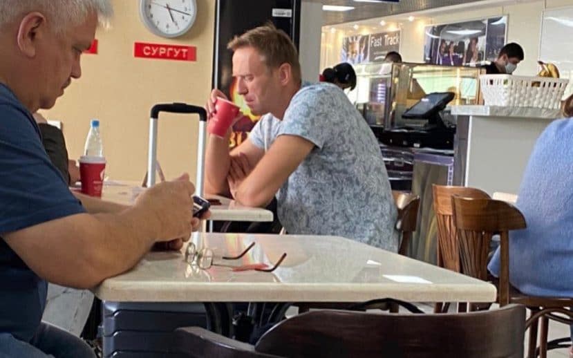 Russian Opposition Alexei Navalny drinking tea in an airport before becoming ill on a flight to Moscow - AmichaiStein/Twitter